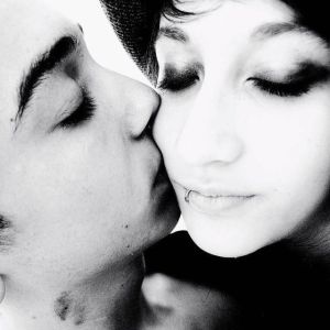 His lips caressed her cheek with a butterfly touch.